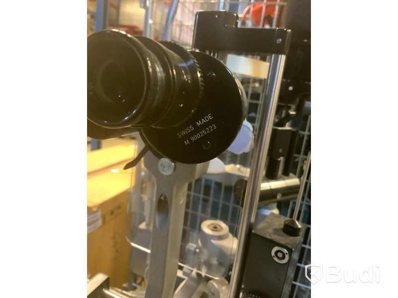 Optiker utrustning, undersökningsbord. Spaltlampa Haag-Streit 900.